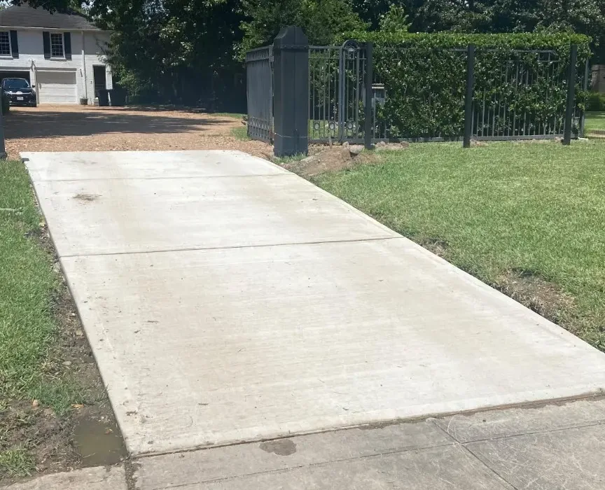 Angled view of the completed residential concrete driveway entrance