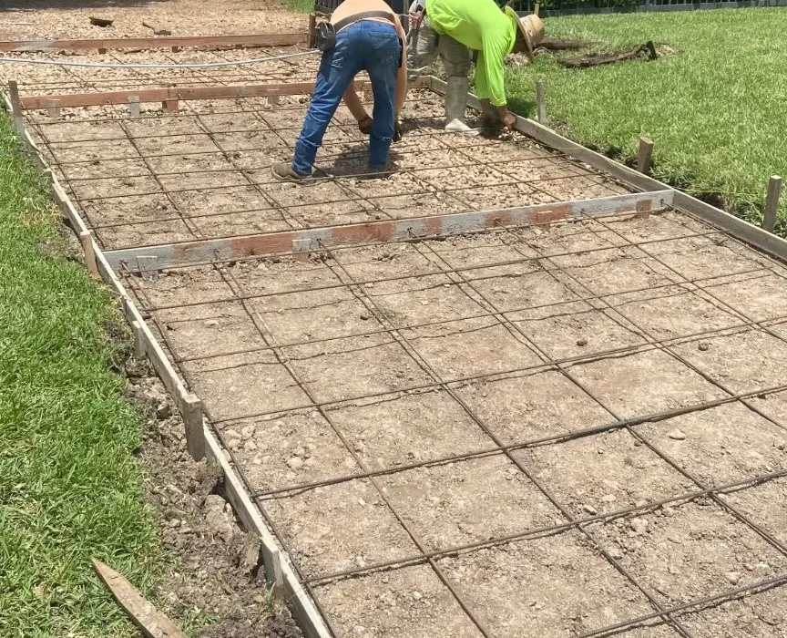 Reinforcing steel installed inside the prepared driveway formwork